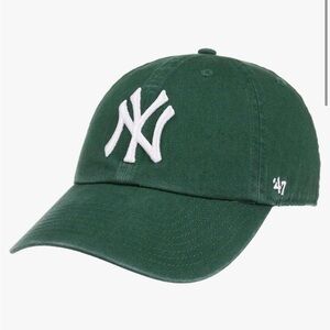 dark green Yankees hat